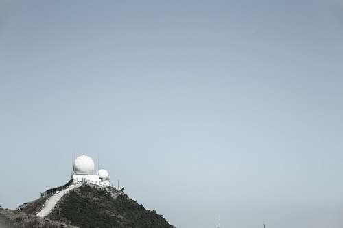 kowloon peak viewing point white dome building on top of mountain hong kong